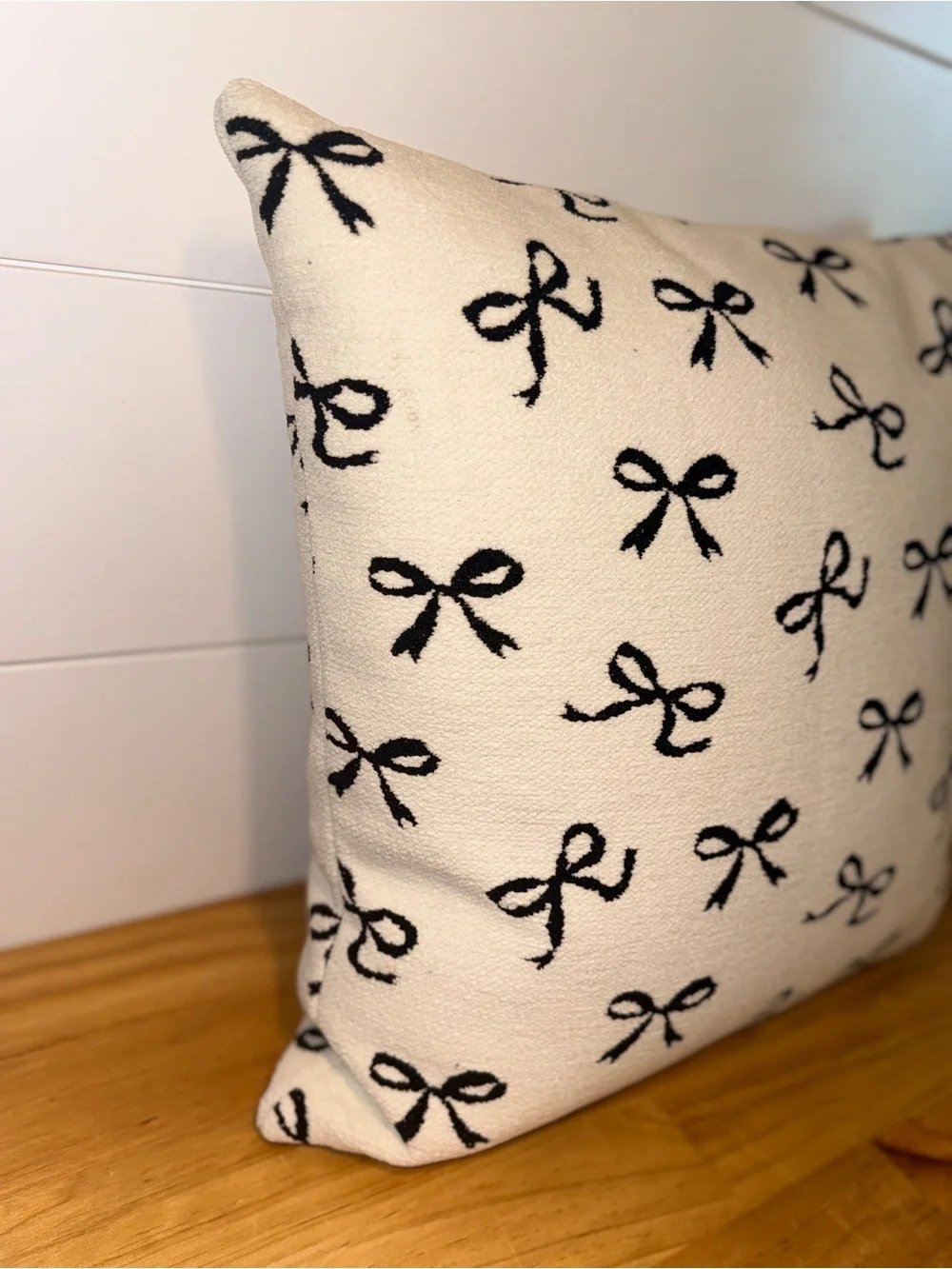 Cynthia Rowley Ivory Throw Pillow with Black Bow Pattern